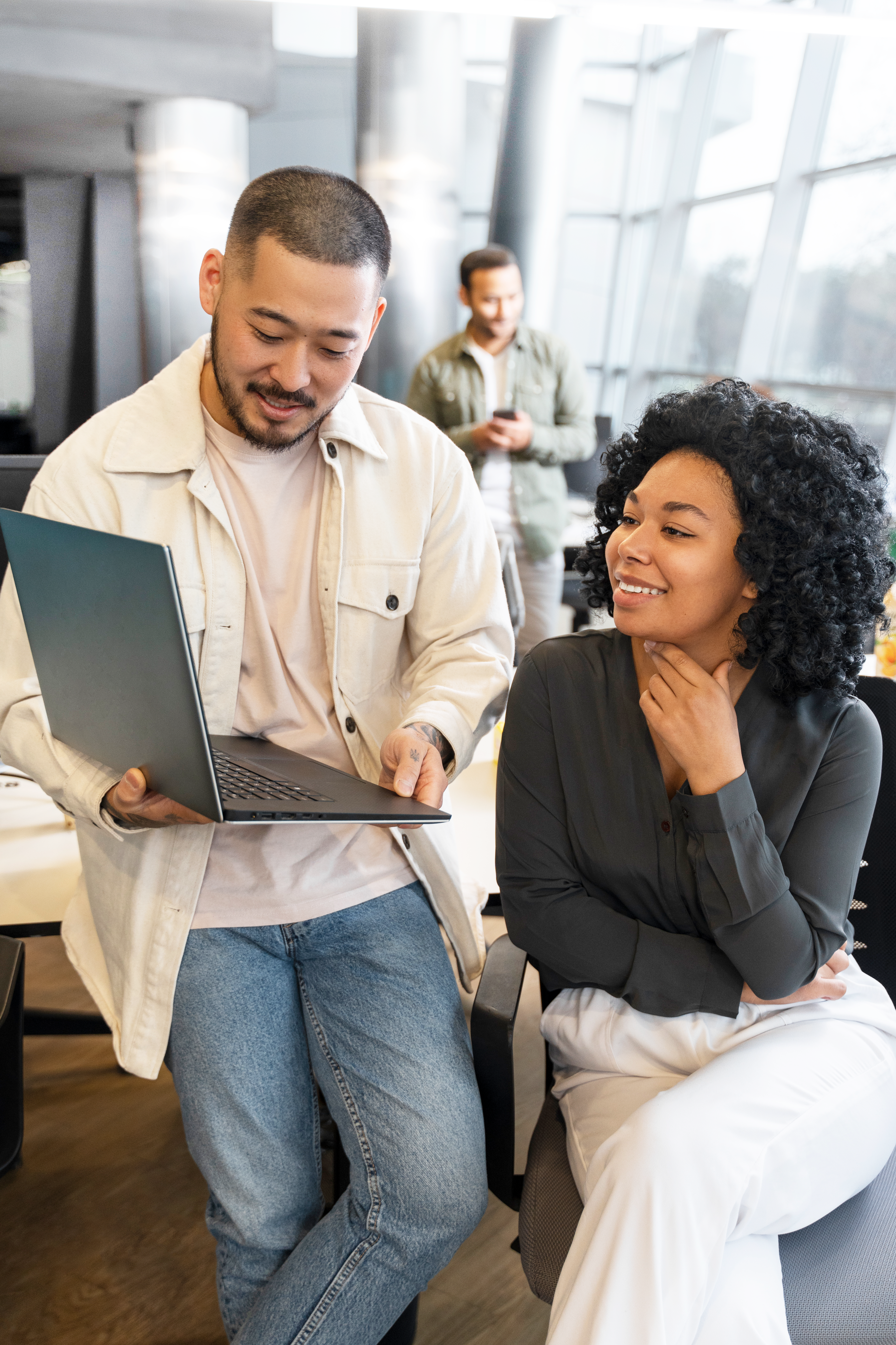 client support helping client on laptop