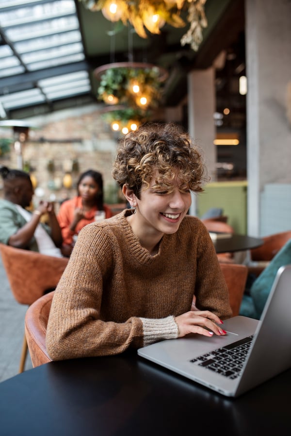 medium-shot-woman-reading-coffee-shop