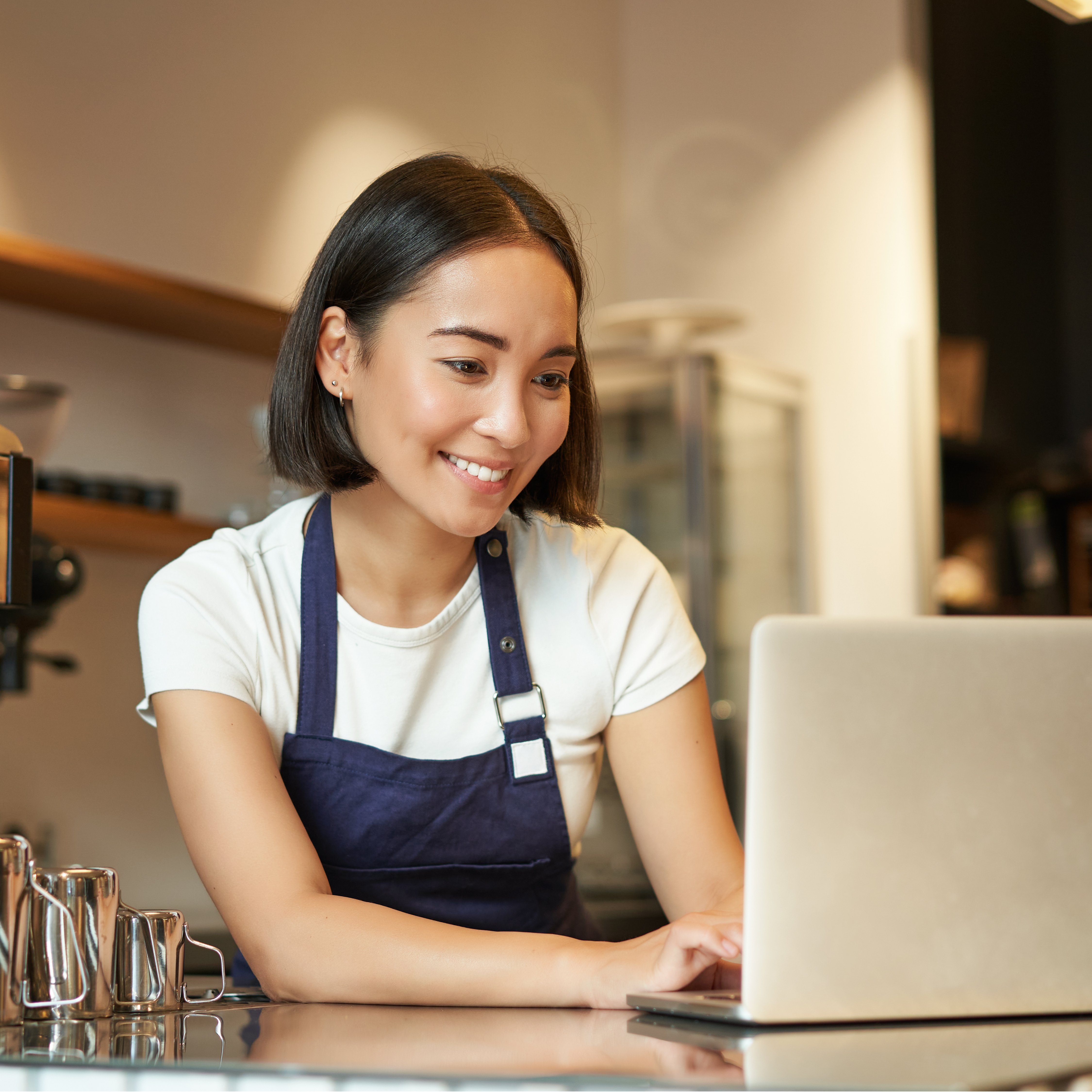 Business woman utilising Apteans' purpose built ERP solution for food and beverage